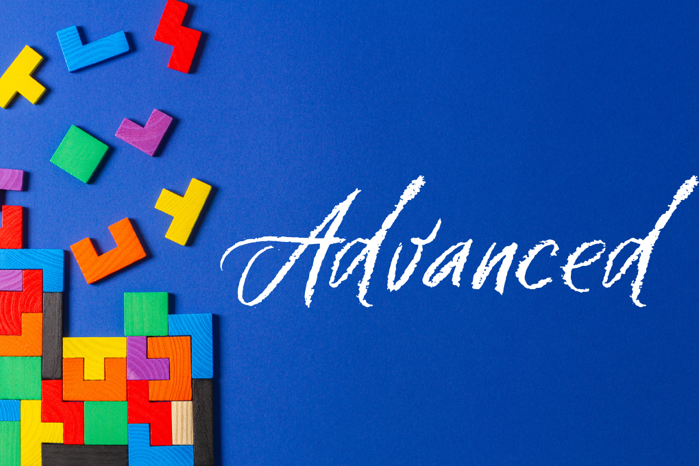 Blue background with colourful puzzle blocks and the word “Advanced”