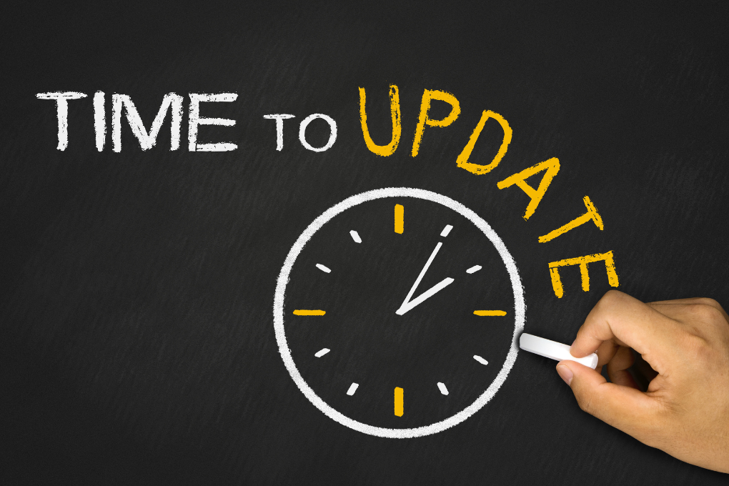 Chalkboard with “Time to Update” written above a clock illustration